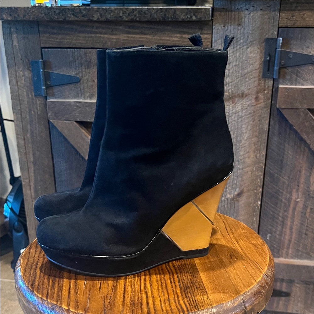 B. Makowsky Black Ankle Boots with Gold Wedge